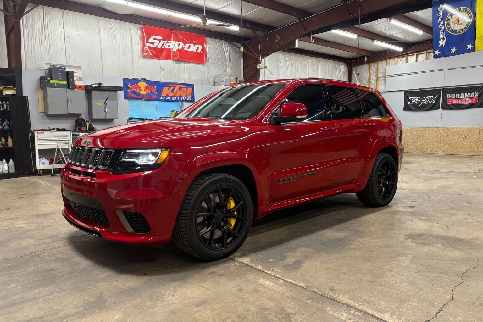 Red Jeep Trackhawk inside the 630 Detailing shop in Oswego, Illinois